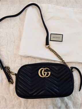 Black crossbody purse with Gold Hardware